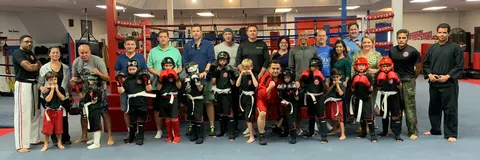 Kids MMA class panorama at Amir Academy